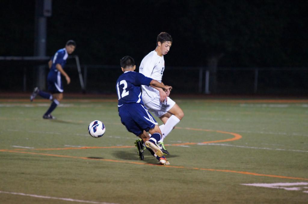 Junior Thomas Vondrak competes for the ball against the opposing team on September 17. 