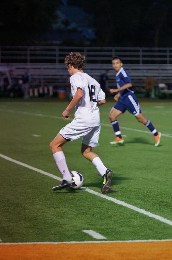 Sophomore Kevin Reilly dribbles towards the goal on September 17. 