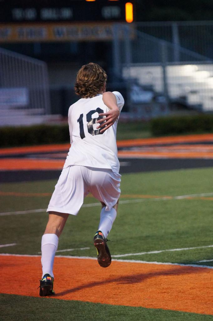 Sophomore Kevin Reilly sprints after the ball during a game against Chicago Washington on September 17. 