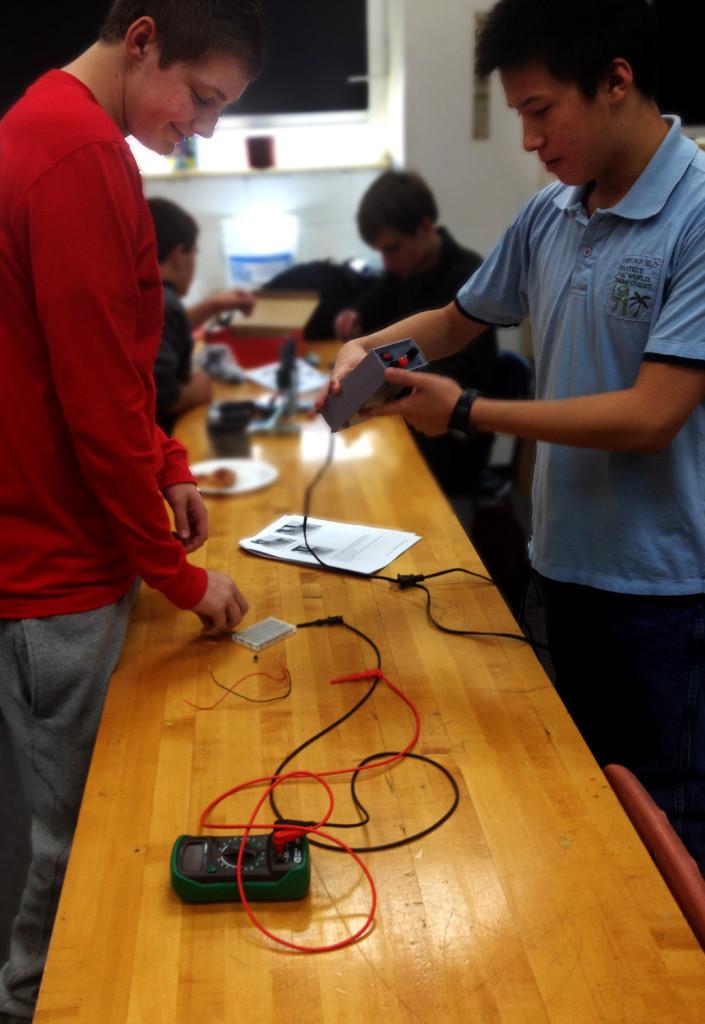 Sophomores Jack Bloom, Spencer Wells, Connor Clausen and Junior Tommy Watson work on various projects in PTLW