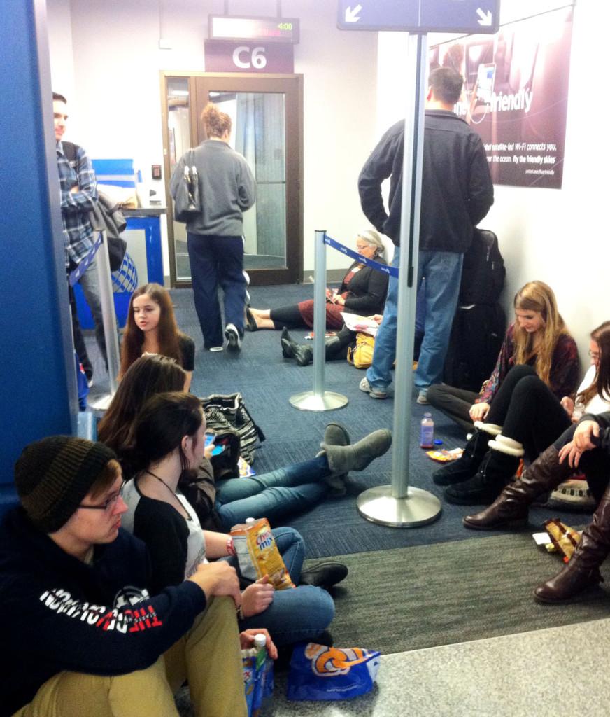 Drops of Ink staff awaits news on a connecting flight from Cleveland to Chicago