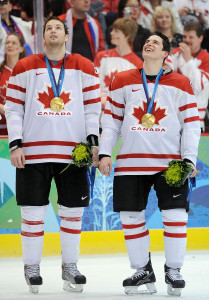 Rick Nash (left) and Sidney Crosby (right) absorb the fame at the medal ceremony in 2010.