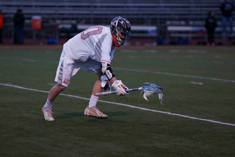 Junior Nick Bagatti cradles the ball. 