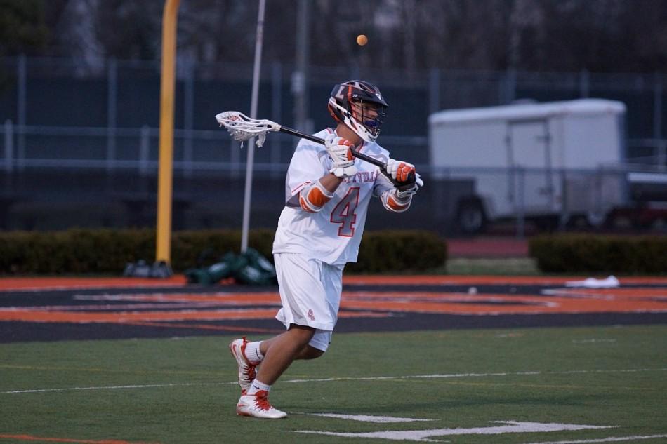 Junior Henry Burns passes the ball to a teammate. 