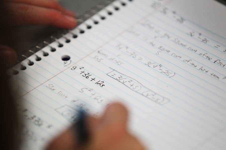 A student works on math problems at Oakton Community College in Des Plaines, IL.