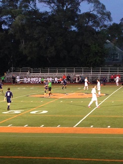 Wildcats defenders rush back to defend a counter-attack by Evanston.