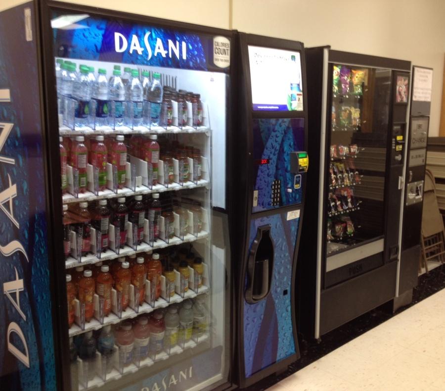 Pictured on the left is one of the new vending machines and to the right is one of the old machines with now higher priced chips.