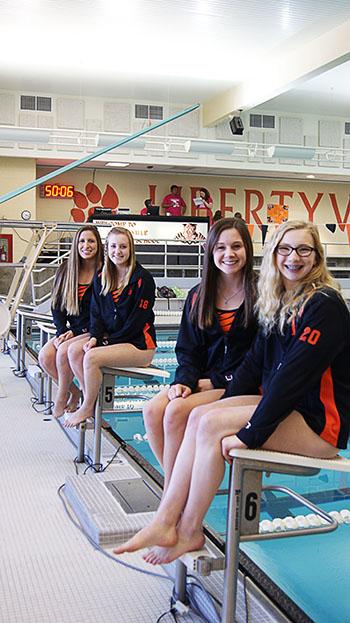 The relay team from left to right: Staci Herchenbach, Emma Richert, Macey Neubauer, and Meredith Robbins. 