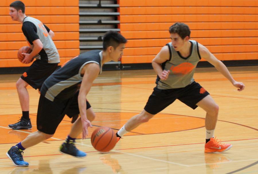 Junior Cam Chen drills against junior teammate Ethan Fowkes in a recent practice.