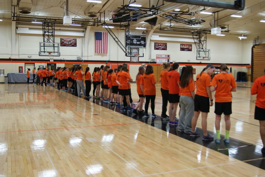 Freshman and sophomore gym classes are lined up to run the pacer test.