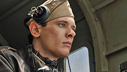 Jack OConnell portrayed as Louis Zamperini aboard a B-24 bomber