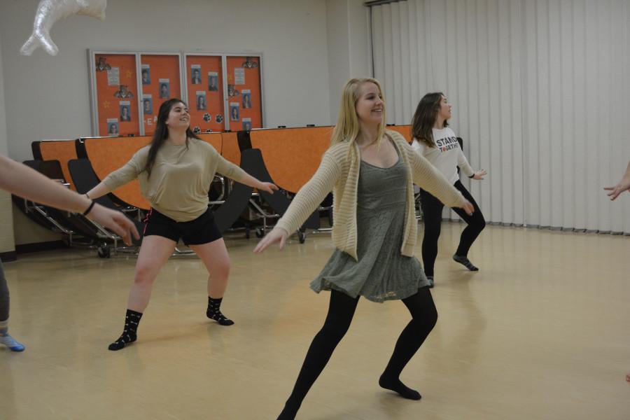 Orchesis dancers (Hannah Jones; left, Emily Forrest; middle, and Mady Basich; right) displaying their graceful poise, and elegant skill. 