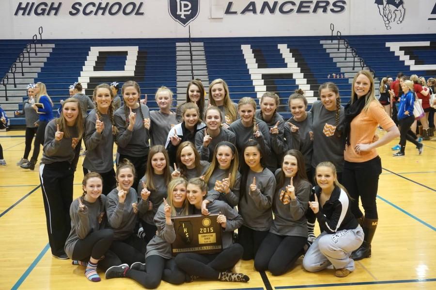 The+Varsity+Poms+team+poses+with+their+Sectional+Championship+Plaque.%0APhoto+courtesy+of+Emily+Yates