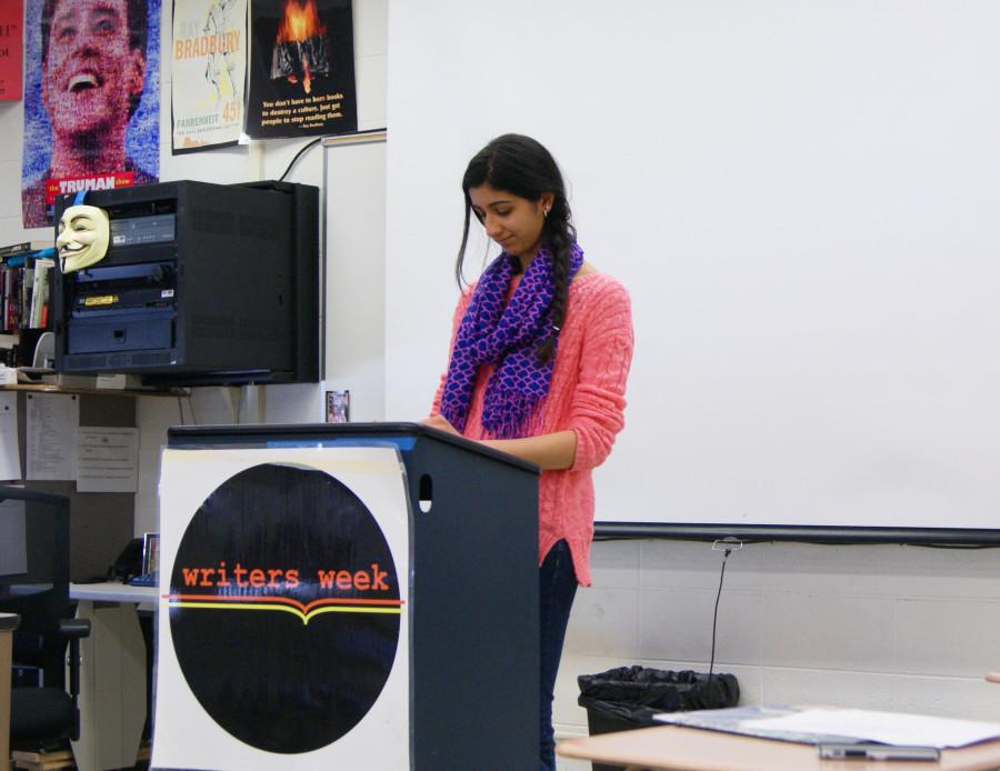 Junior Sarah Arora practices her piece that she will present during Writers Week.