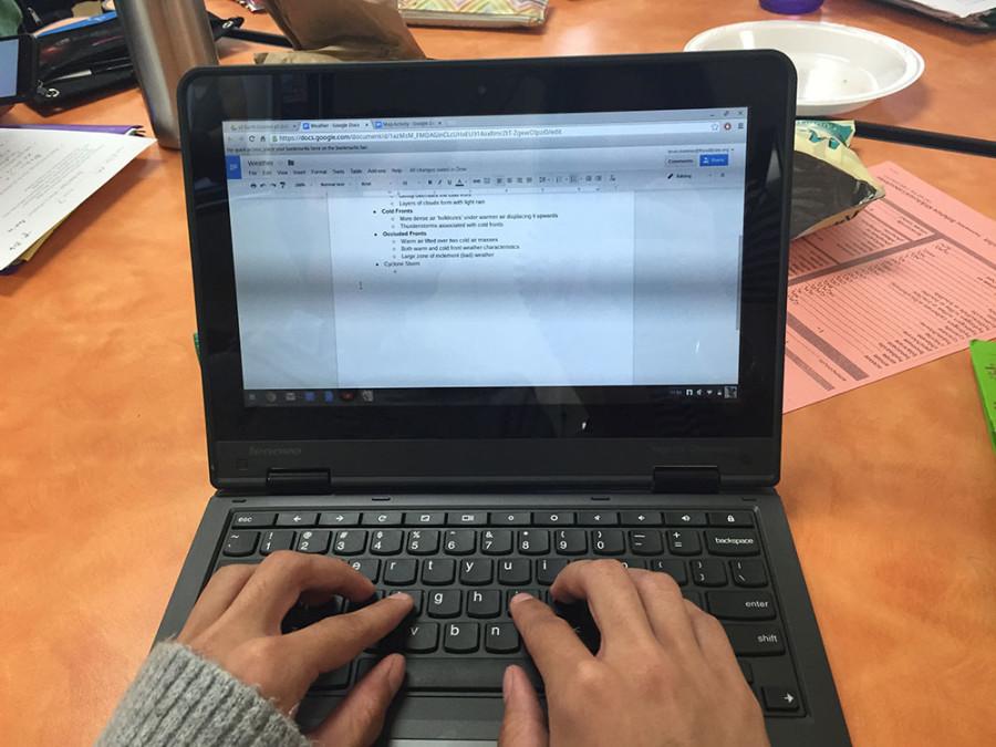 Sophomore Kevin Loumeau is able to take Earth Science notes on his Chromebook at lunch. 