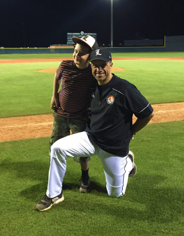Carlucci kneels with his youngest son, Joey.