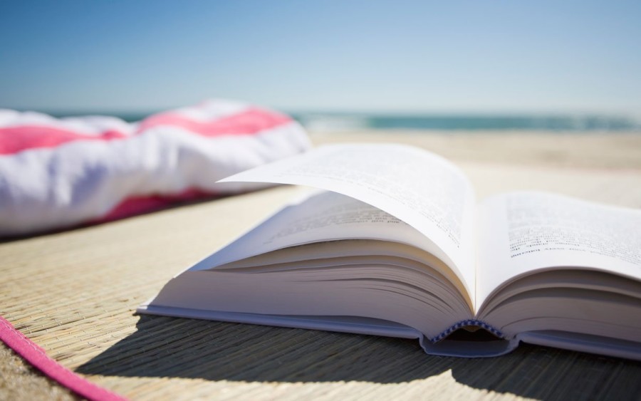 One way to relieve the stress of feeling like you have "homework" over the summer is to take your novels to the beach. 