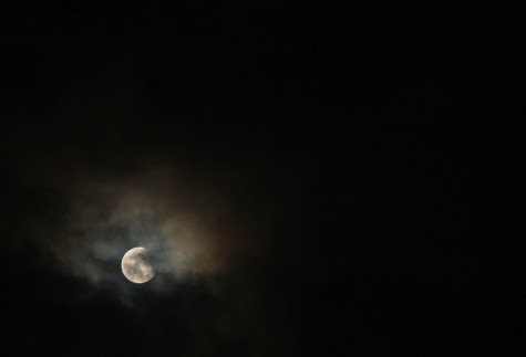 By 10:15 P.M., the moon no longer had its reddish "blood" tint, and returned to its normal coloration, viewable through the clouds.