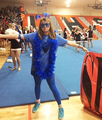 Senior Emily Dudley shows senior pride while representing her class during the homecoming assembly