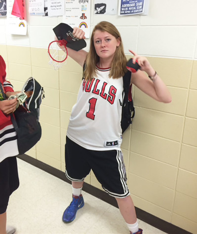 Senior Emily Dudley shows school spirit by participating sports fan day during homecoming week