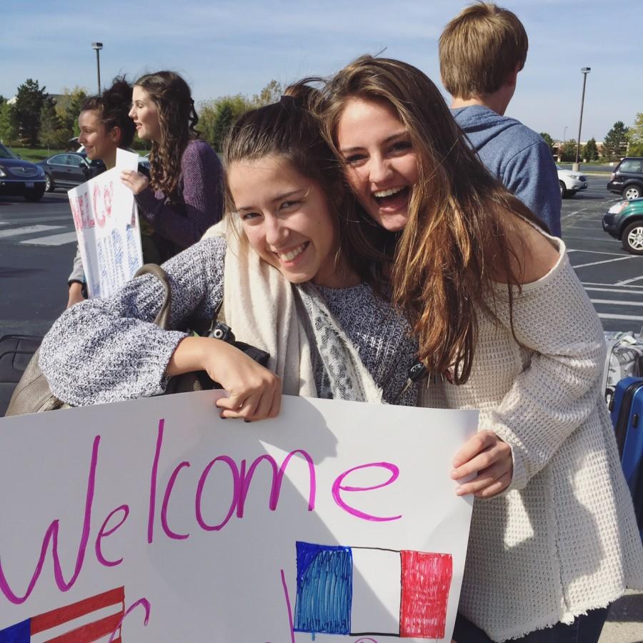 Abby Jeffrey enthusiastically welcomes Eugénie Guerineau to the United States, having last seen her in France during the summer as part of the French-American exchange program.