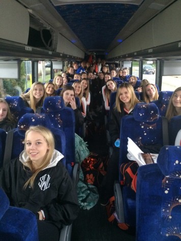 On their bus to state, cheerleaders took the back of the bus, while poms took the front.