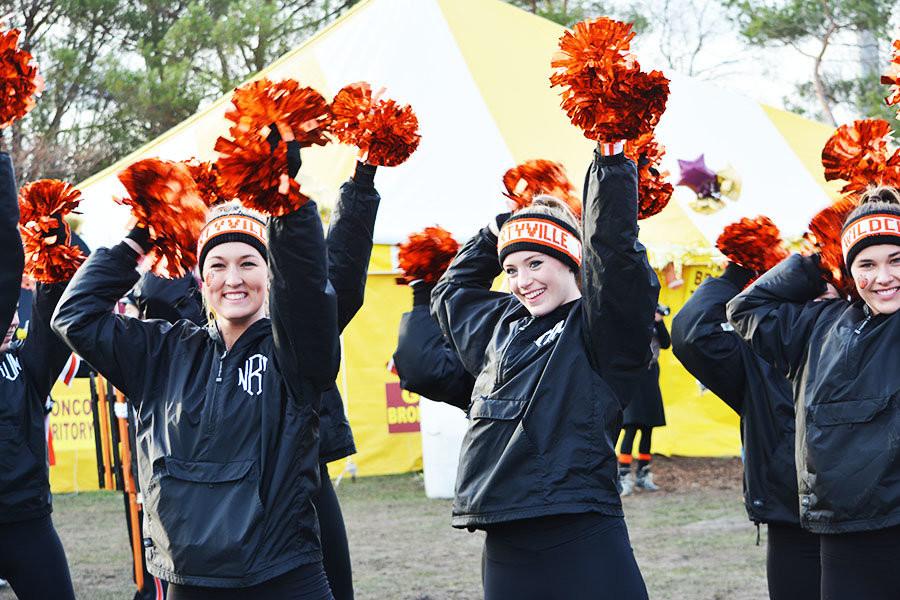 Outside+of+the+pregame+tent%2C+IHSA+held+a+spirit+off+between+Glenbard+West+and+Libertyville.+The+Libertyville+marching+band%2C+cheer+team%2C+and+poms+team++were+present+to+entertain+the+Wildcat+fans.++Nellie+Richardson%2C+Mary+Ahern%2C+and+Nikki+Westphal+helped+lead+the+poms+team+in+their+dances.