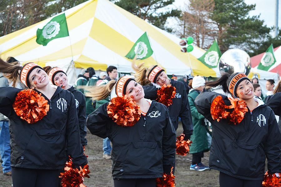 The band, cheerleaders, and poms team helped pump up the fans as they prepped for the game. Seniors Emily Yates (also on Drops of Ink), Kristen Luce, and Katarina Pong enjoyed the last pregame of their high school career. 