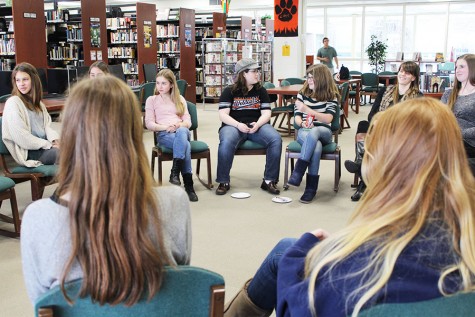 Students in Book Club participate in an active discussion about their latest read.