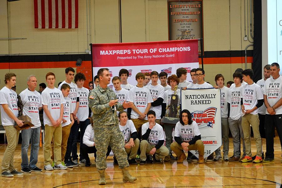 The boys soccer team accept their National Guard recognition for being one of the top ranked teams in the nation.  