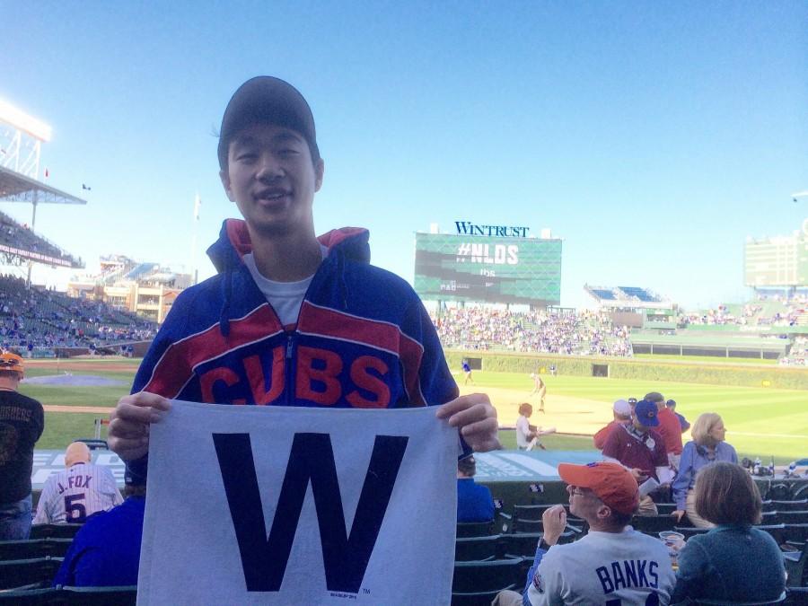 Senior Cameron Chen holds the famous “W” flag at Game 4 of the NLDS vs the Cardinals last season.
