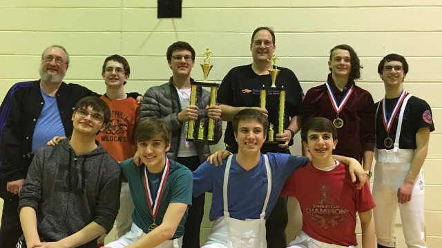Members of the mens sabre and mens epee team after winning the conference championship.