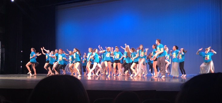 Orchesis+dancers+celebrate+after+their+first+performance+on+Thursday%2C+May+12.+