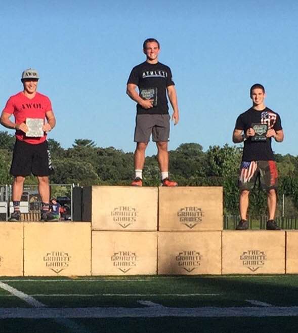 Sterner stands atop the podium after finishing in first place for the teenage division at the 2016 Granite Games.