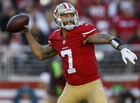 San Francisco 49ers starting quarterback Colin Kaepernick throws against the Arizona Cardinals on Dec. 28, 2014.