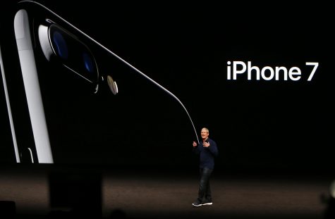 Apple CEO Tim Cook introduces the iPhone 7 on Sept. 7, 2016 in a San Francisco auditorium.