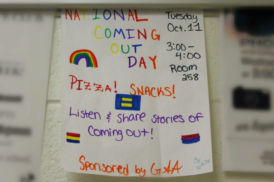 One of the many student-made posters that are hung throughout LHS to  publicizes GSAs National Coming Out Day meeting.
