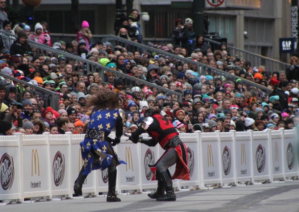 The battle begins between two men from opposing sides who battle it out for victory to arouse the crowd for the parade, which followed soon after. 


