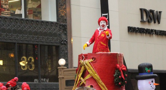 As the first float comes down the road, the Honorary Grand Marshall, Ronald McDonald excites the crowd.


