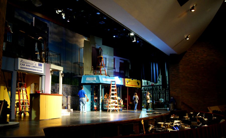 The stage crew sets up for last Wednesday’s dress rehearsal, the final rehearsal before opening night.