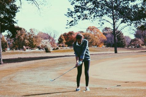 Mikaelian takes a short chip shot onto the green.