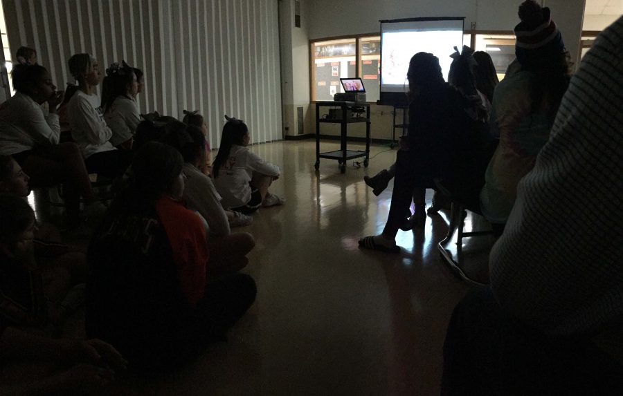 Maddys friends and family watch a slideshow of all the memories theyve shared with Maddy. 