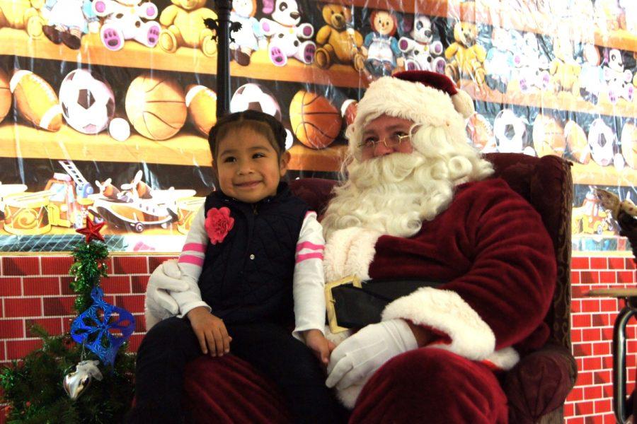 A special guest, Santa Claus, made an appearance at the WISH dinner to visit with the children.
