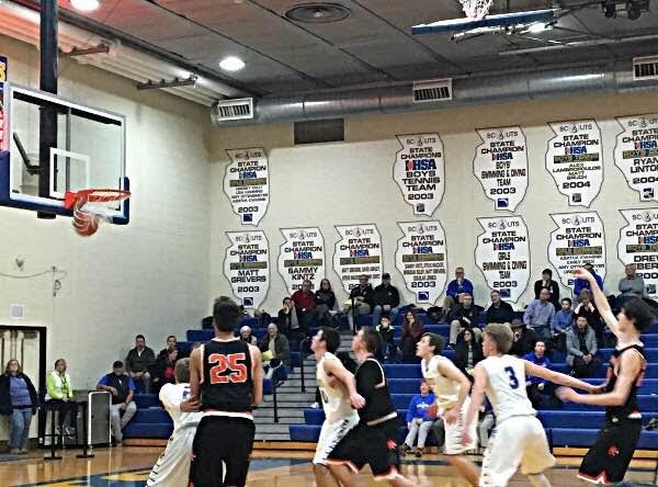 Drew Peterson makes a free throw for the Cats during the team's win at Lake Forest.