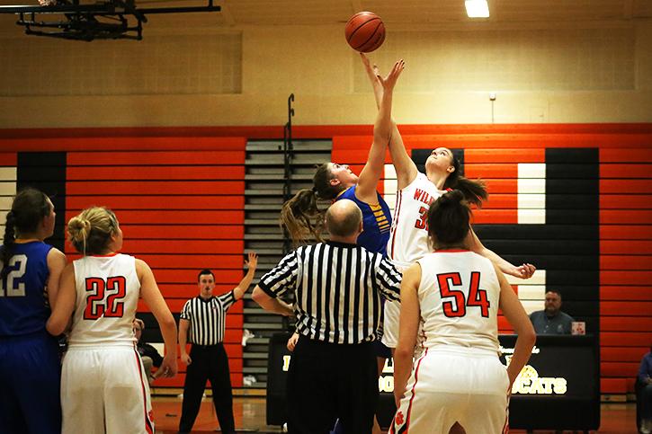 Senior+Caroline+Frea+wins+the+tip-off+to+begin+overtime.