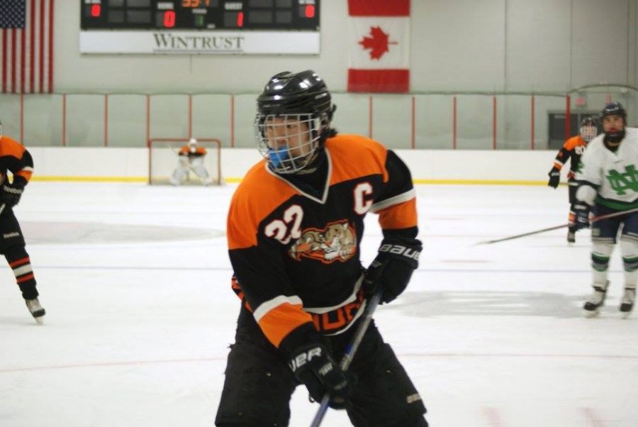 Main Captain Justin Agemura  scans the ice during a 2-1 win against Notre Dame.