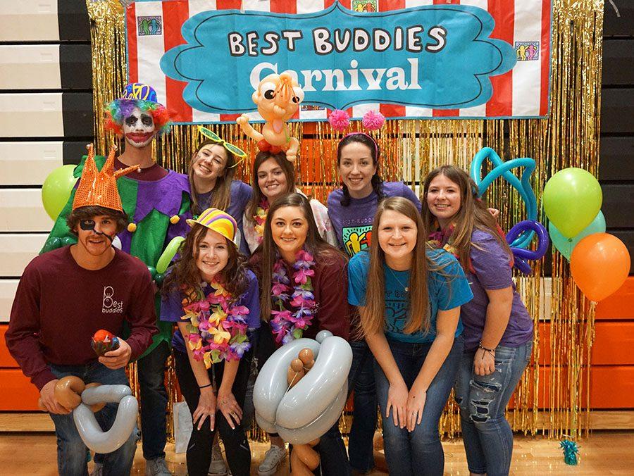 The Best Buddies board members smile after the success of the carnival. 