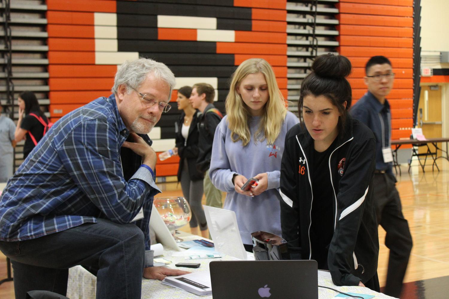 An employee from Gurnee Counseling Center demonstrates to students what the job entails and the many ways students can get involved to benefit their community.