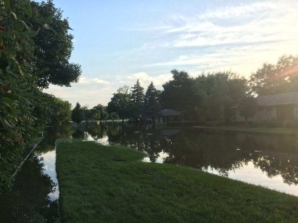 The flooding of many homes and yards, including those here on Dawes Street, trapped some people in their homes and led to serious damage to people's properties.
