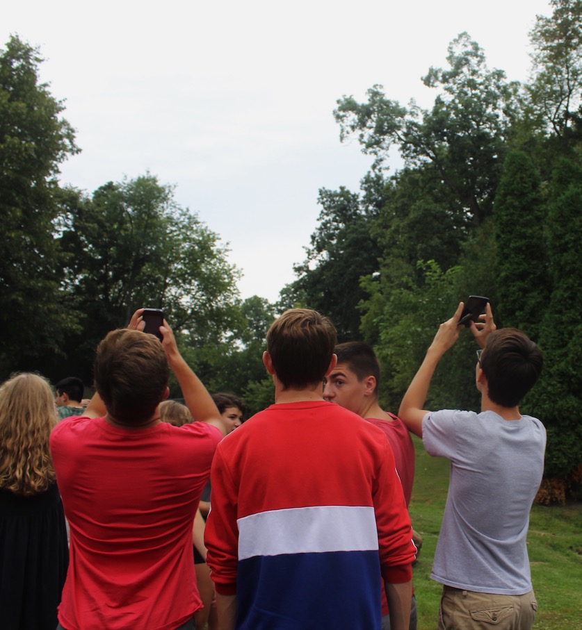 Some students were previously advised to avoid using their cellphones for pictures, but because of the cloud coverage, many students ended up taking pictures with their phone aimed directly toward the sun.
